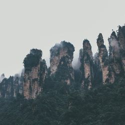 Scenic view of rock formation against sky