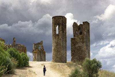 Low angle view of old ruins against sky