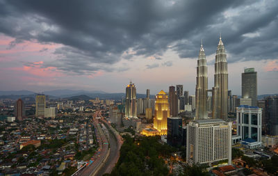 City lit up at dusk