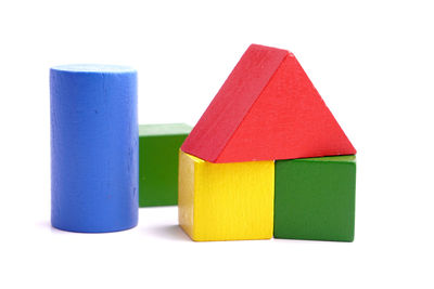 Close-up of toy blocks over white background