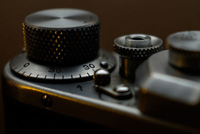 Close-up of knob on camera