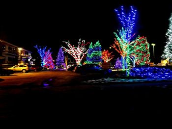 Illuminated street at night