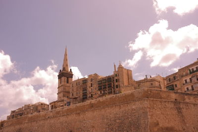 Low angle view of historic building against sky