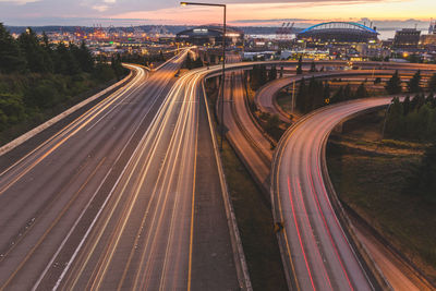 High angle view of light trails on road at night