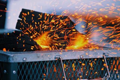 Close-up of fire on barbecue grill