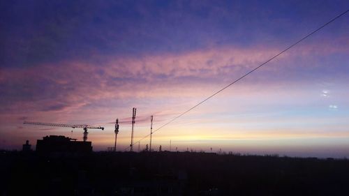 Silhouette of tree against sky at sunset