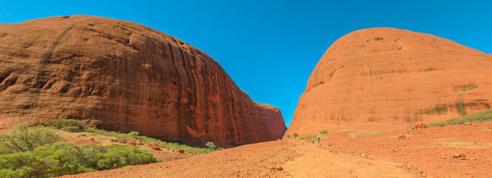 Low angle view of rock formation against sky