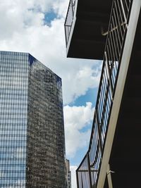 Low angle view of modern buildings against sky