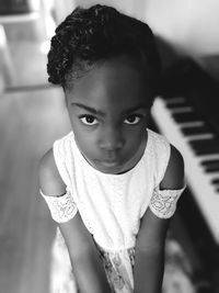 Portrait of cute girl standing outdoors