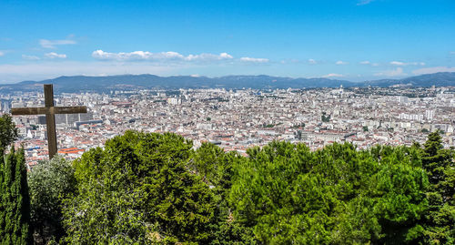 Aerial view of townscape against sky