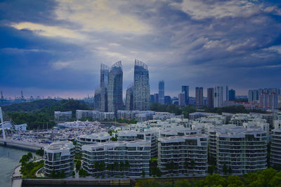 Buildings in city against sky