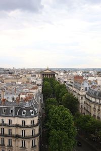 High angle view of buildings in city against sky