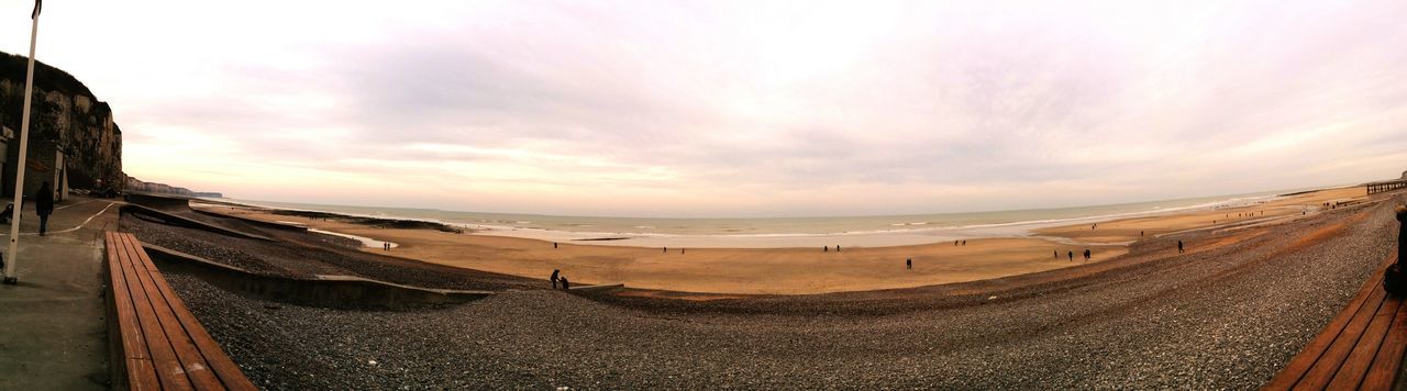 sea, beach, horizon over water, sand, sky, shore, water, scenics, beauty in nature, tranquil scene, tranquility, cloud - sky, incidental people, nature, panoramic, idyllic, vacations, coastline, cloud, outdoors