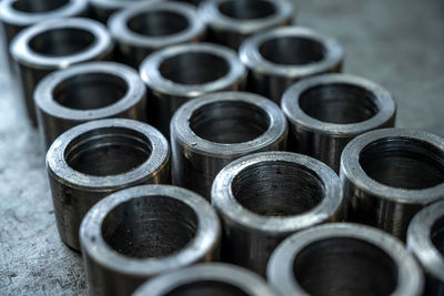 High angle view of pipes in container on table