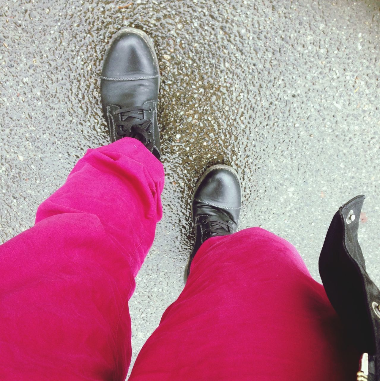 low section, shoe, person, personal perspective, footwear, lifestyles, standing, jeans, high angle view, street, human foot, red, men, leisure activity, casual clothing, canvas shoe, day