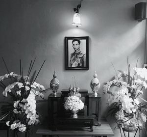 Flower vase on table at home