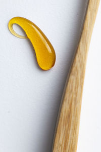 High angle view of yellow fruit on white background