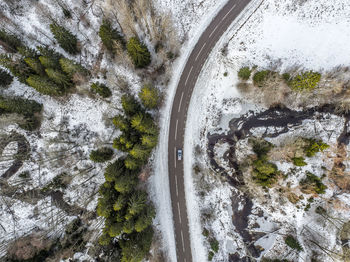 High angle view of trees by road against sky