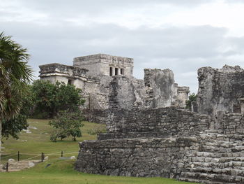 Old ruin building against cloudy sky