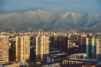 High angle view of buildings in city against sky