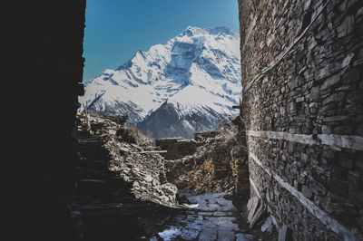 Scenic view of snowcapped mountains against sky during winter