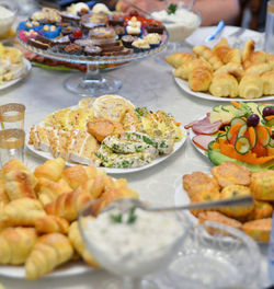 Close-up of various foods in plates on table