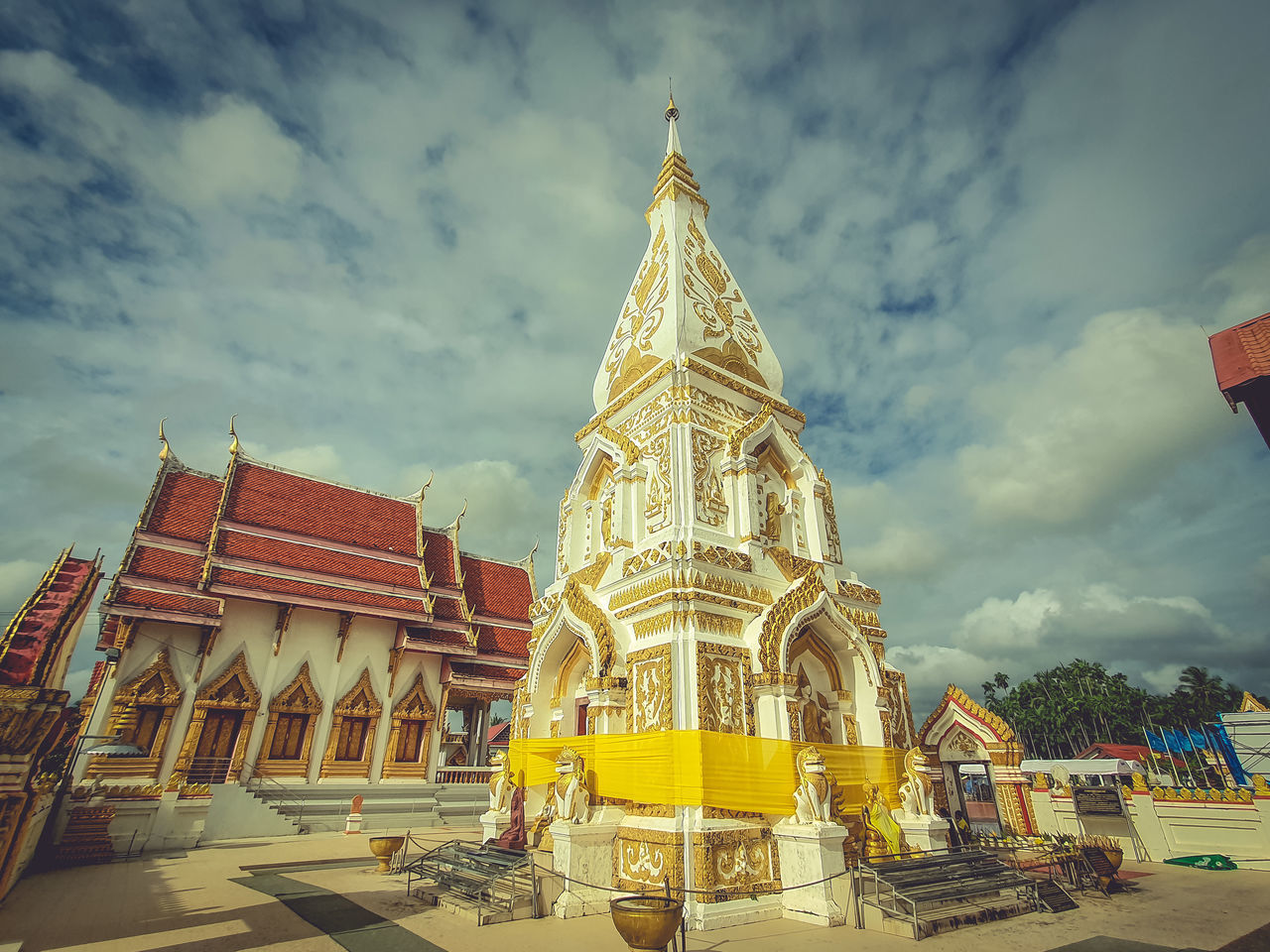 LOW ANGLE VIEW OF TEMPLE AGAINST BUILDINGS