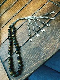 High angle view of necklace on table