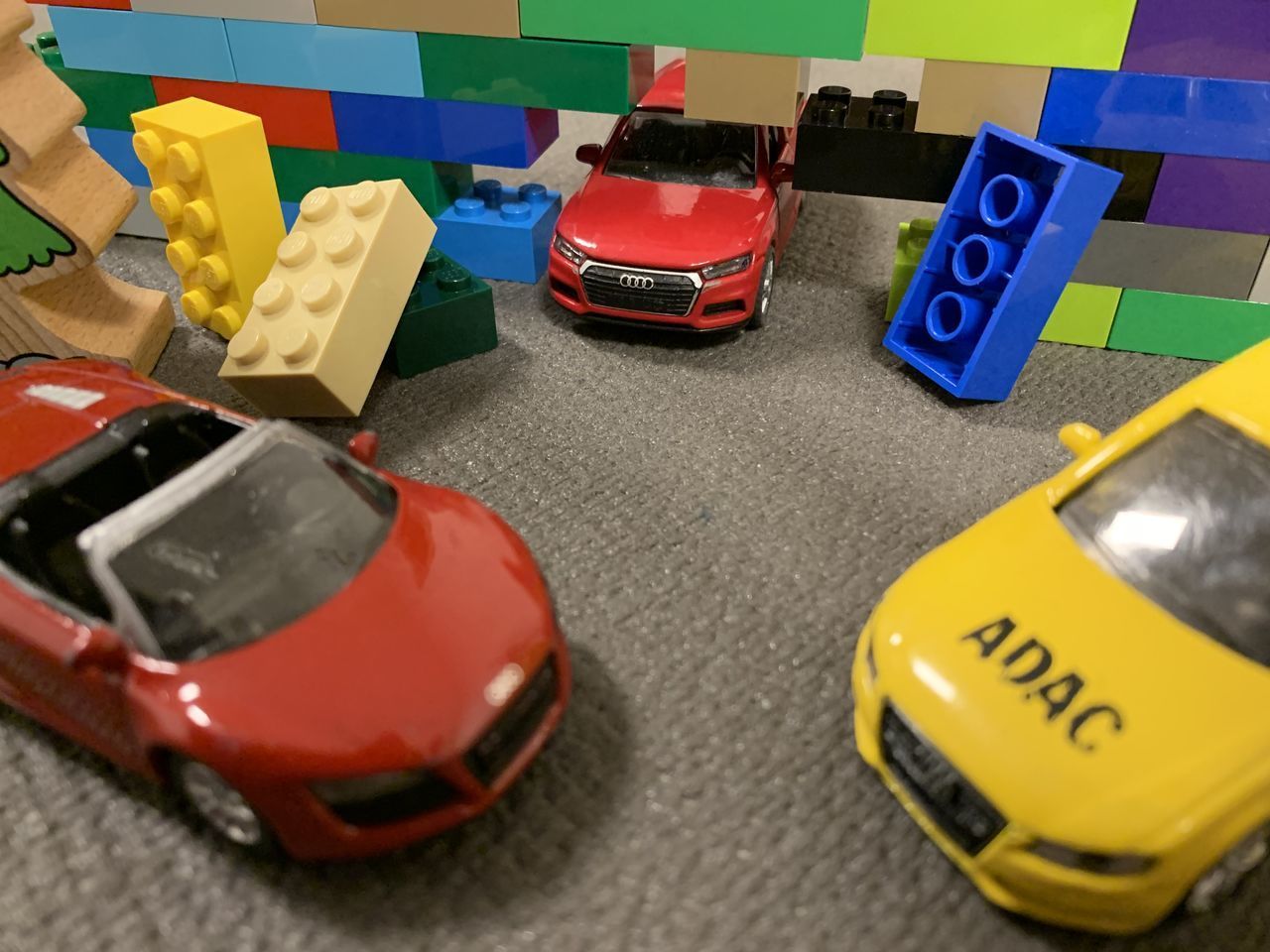 CLOSE-UP HIGH ANGLE VIEW OF TOY CAR
