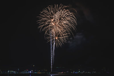 Firework display at night during new year