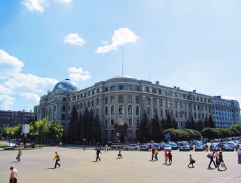Group of people in front of building