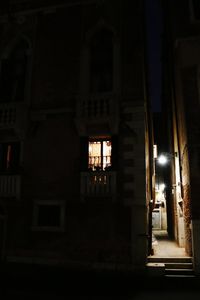 Low angle view of illuminated building at night