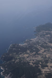 High angle view of city by sea