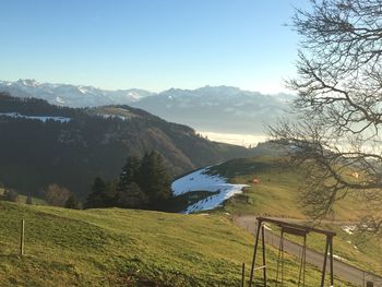 Scenic view of mountains against clear sky