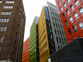 Low angle view of skyscrapers against sky