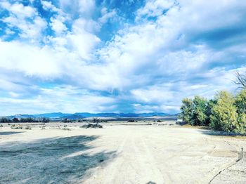 Panoramic shot of land road against sky