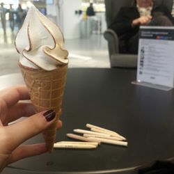 Cropped image of woman hand holding ice cream