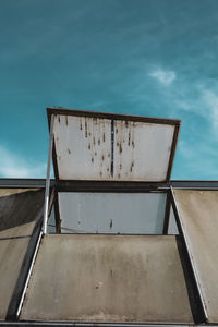 Low angle view of building against blue sky