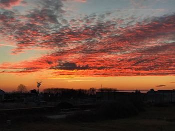 Scenic view of dramatic sky during sunset