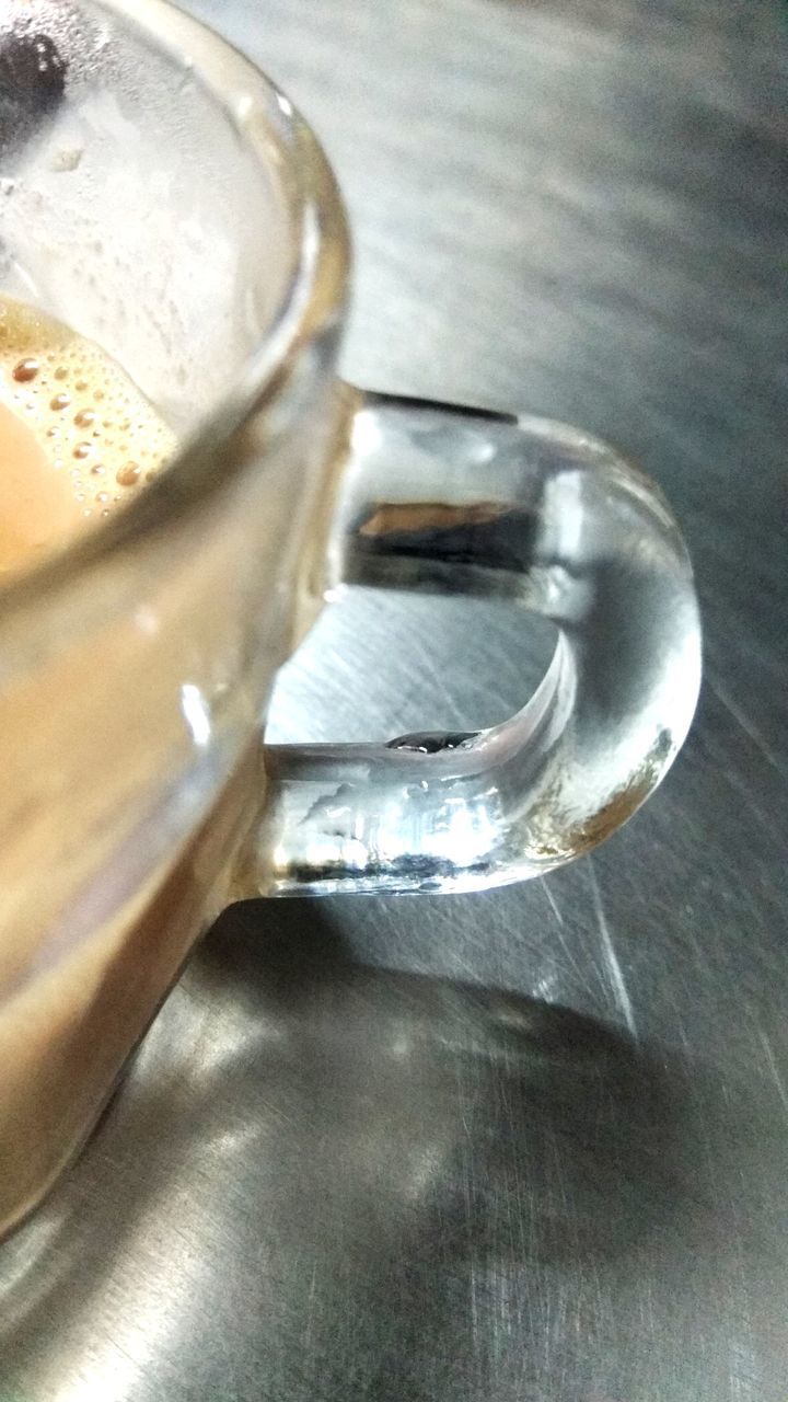 CLOSE-UP OF COFFEE ON TABLE