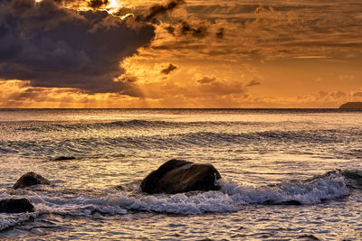 Scenic view of sea against sky during sunset