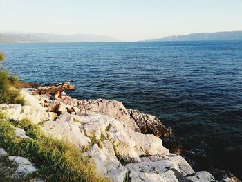 Scenic view of sea against clear sky