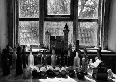 View of bottles in window