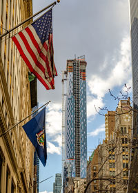 Low angle view of modern buildings against sky