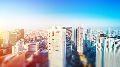 Modern buildings in city against sky