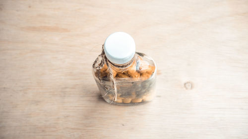 Close-up of drink in jar on table