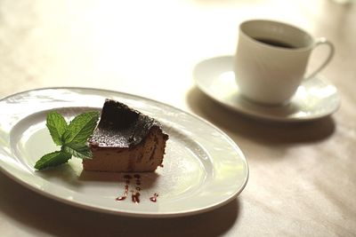 Close-up of cake served with coffee