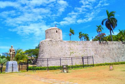 Castle against cloudy sky