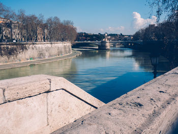 Bridge over river against sky