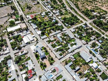 High angle view of street amidst buildings in city